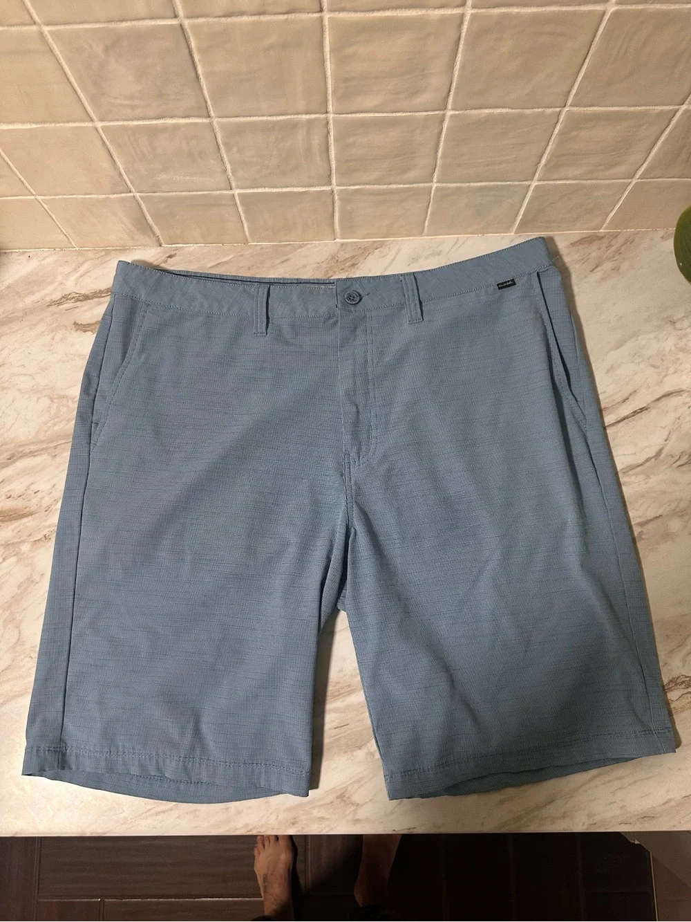 TravisMathew blue golf shorts size 38